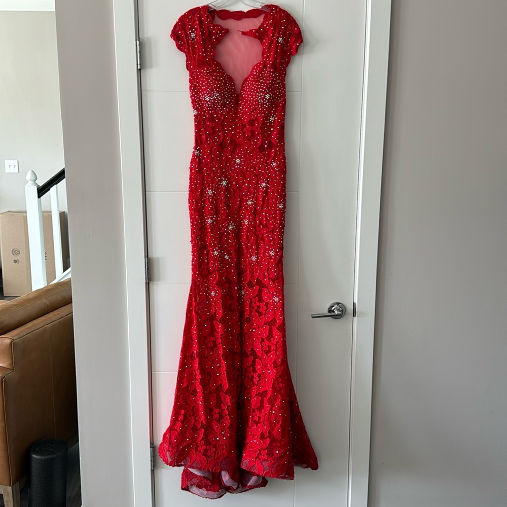 Jovani mermaid style formal/prom red dress with beads in size 4.